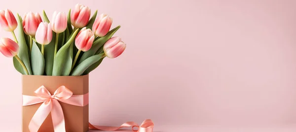 depositphotos_690441474-stock-photo-bouquet-tulips-gift-bag-pastel.jpg